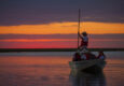 Argentina ibera hotel puerto valle boat ride at sunset